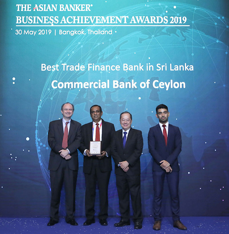 Commercial Bank’s Deputy General Manager - Corporate Banking Mr Naveen Sooriyarachchi (2nd from left) accepts the award won by the Bank at the 2019 Asian Banker Transaction Awards ceremony in Bangkok