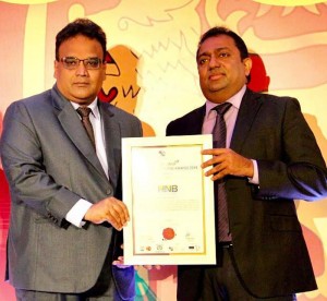 HNB Head of Human Capital Management, Indrajith Senadhira receiving the award for Best Employer Brand 2019 from Minister of Education, Akila Viraj Kariyawasam