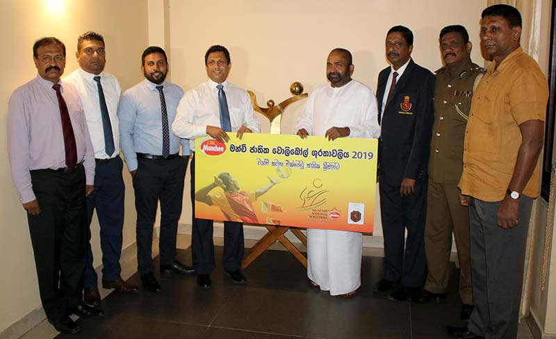 Nalin B  Karunaratne, Chief Executive  Officer of  Ceylon Biscuits Limited (fourth  from  left) presenting  the  sponsorship for the Munchee National  Volleyball Championship 2019 to Ranjith  Siyambalapitya, MP and President of Sri Lanka Volleyball Federation (SLVF), flanked by officials from Munchee  and  SLVF.