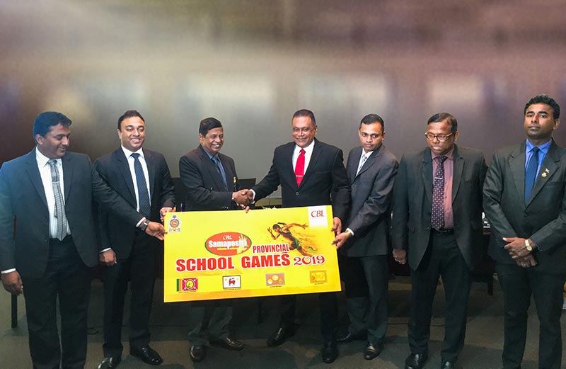Shammi Karunaratne, Director/CEO (CBL Plenty Foods) together with Jayanga Perera, General Manager Marketing (CBL Food Cluster), H.G. Channa Karunasena, Assistant Director of Education (Physical Education & Sports - Uva Province), E.G.P.I. Dharmathilake, Assistant Director of Education (Physical Education & Sports - Eastern Province), H.K.M. Rajathilake, Deputy Director Education (Physical Education & Sports - North Western Province), Y.M.H.K. Abeykoon, Assistant Director of Education (Health, Physical Education & Sports - North Central Province) and Sunil Jayaweera, Special adviser for Minister of Education.
