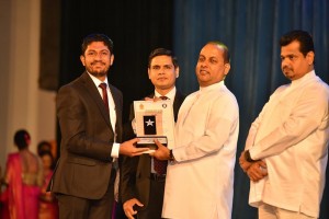 1.Arogya Farm Managing Director Azahim Ali (extreme left) receiving the award from MP Mahinda Amaraweera