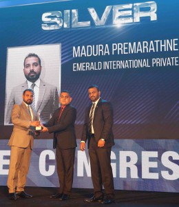 Madura Premarathne receives the silver award in the Executive and Supervisor category at SLIM NASCO