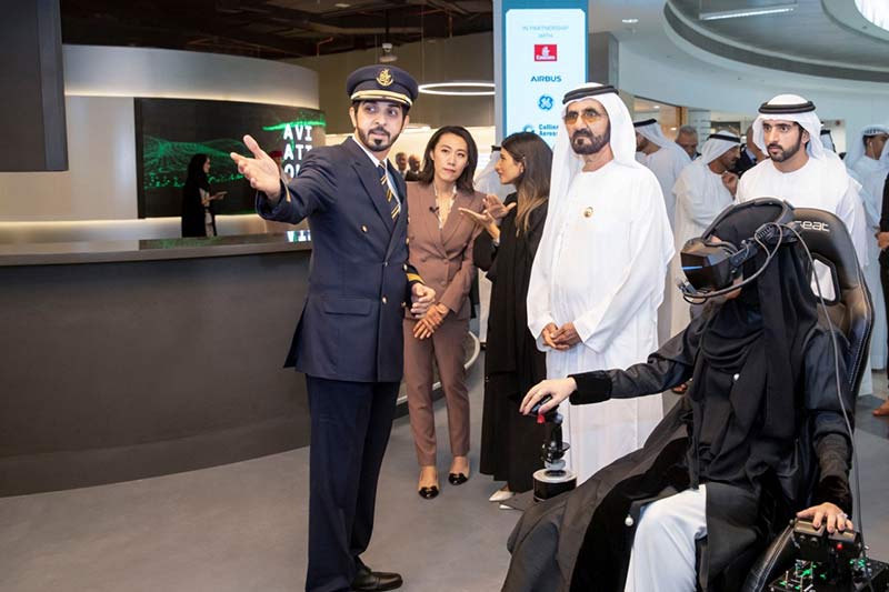 HH Sheikh Mohammed bin Rashid Al Maktoum, Vice President and Prime Minister of the UAE and Ruler of Dubai and HH Sheikh Hamdan bin Mohammed bin Rashid Al Maktoum, Crown Prince and Chairman of the Dubai Executive Council, watched Thales’ demo of Solo, the virtual assistant to pilots. Also seen are (third from left) Amna Al Redha, Aviation X Lab Programme Manager and Emirates’ Capt Mubarak Al Mheiri.