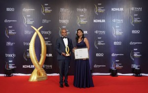 Prime Group Chairman Brahmanage Premalal and Prime Group Deputy Chairman Sandamini Perera with the award for the Best Developer