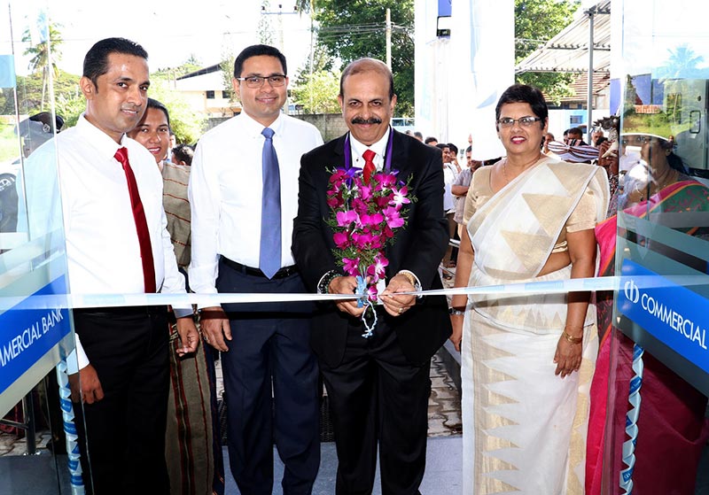 Commercial Bank Deputy Chairman Mr Preethi Jayawardena flanked by the Bank’s Chief Operating Officer Mr Sanath Manatunge and Deputy General Manager – Personal Banking Mrs Sandra Walgama officiates at the ceremonial opening of the Bank’s Madampe branch in the presence of the branch manager and senior management of the Bank.