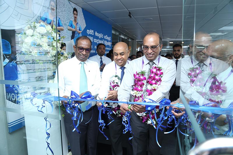 (from left to right) Chief Guests, Mr. Dasantha Fonseka – Chairman, Vision Care Group of Companies, Mr. Nalin Pasquel - General Manager, Asiri hospital Kandy , Dr. V. Shivantha  - Consultant Ophthalmologist, Suwasewana hospital, cutting the ribbon for the opening of business.