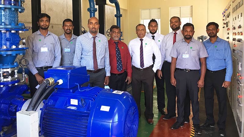 DIMO Executive Director Chaminda Ranawana and General Manager  (Industrial Engineering and Project Management) Chandima Samarasinghe with the Industrial Engineering Team at the opening ceremony 