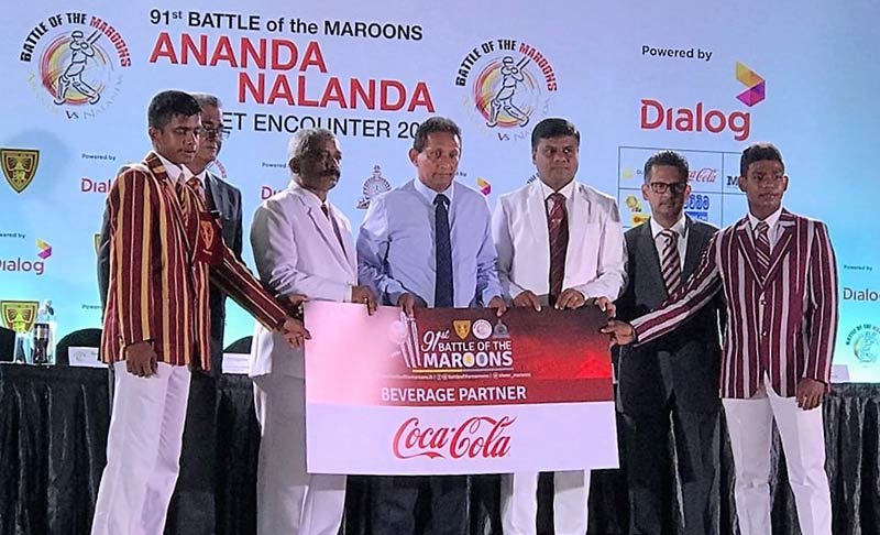 Coca-Cola hands over the sponsorship of the fiercely-contested 91st battle of Ananda and Nalanda (the Maroons) to the respective team captains and school officials present on the occasion. 