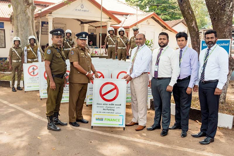 HNB FINANCE donates a consignment of road signboards to Nugegoda Police 