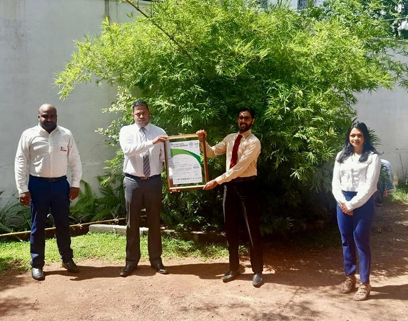 The handing over of the “CarbonNeutral®” certificate; (From left to right): Javaskar Yogarajah- Service Manager Gpc, Exterminators, Travis Ferreira - Director / CEO, Exterminators, Sajeewa Ranasinghe - Asst. Manager - Sustainability Assurance and Advisory Services, CCC and Ruwanthi Halwala - Asst. Manager - Client Relationship Management, CCC.