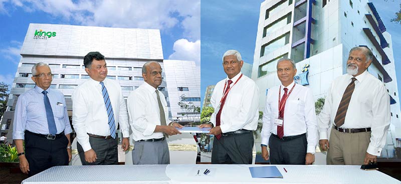 Ceylinco Healthcare Services Limited (CHSL) Chairman Mr R. Renganathan (3rd from right) and Kings Hospital Chairman Dr. Palitha Abeykoon exchange the agreement in the presence of (from left) Kings Hospital Director Ethics and Governance Dr. Upali Banagala, Managing Director Prof. Srinath Chandrasekera, CHSL Director Mr Thushara Ranasinghe and CHSL Medical Director Prof. Rohan Jayasekera.