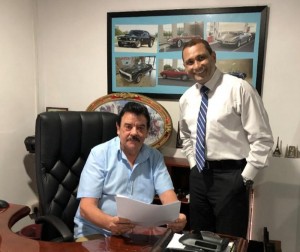 Peter Norman Hill, Founder/Chairman of Autogroup International (seated) with Chamath Tennekoon, Managing Director