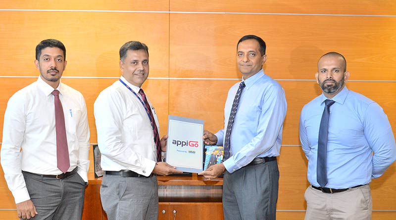 (From Left), HNB Lead – Merchant Services & Digital Pay Products, Nawaf Munaver, HNB Deputy General Manager- Retail and SME Banking, Sanjay Wijemanne, hSenid Group of Companies Founder and Chairman, Dinesh Saparamadu and hSenid Manager-Systems Engineering Support, Manuja Jayamanne