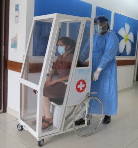 A patient being transported in the novel Infectious Patient Transportation Chamber (IPTC)