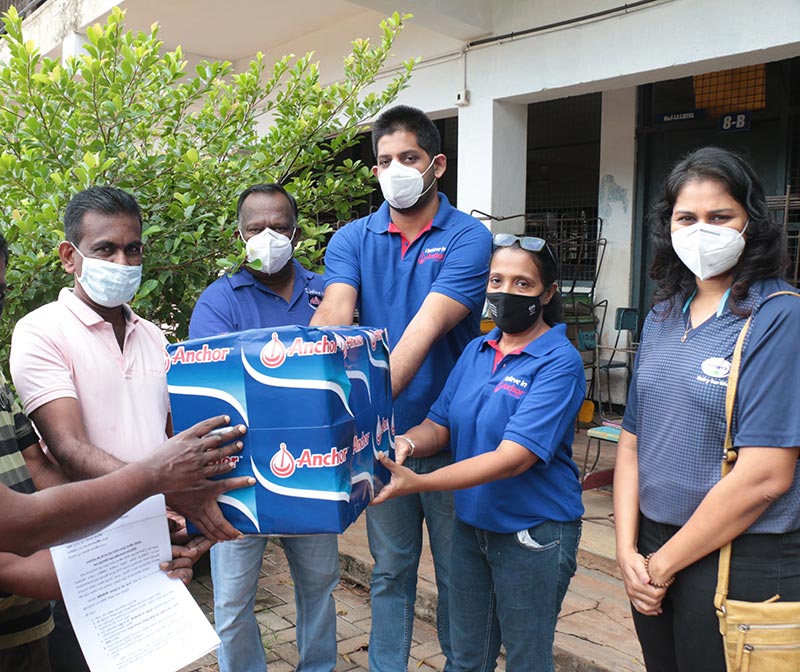 Anchor team donates surgical masks and hand sanitiser to be used by both schools