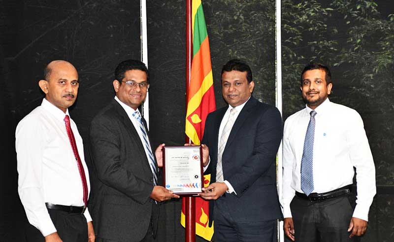 Awarding the ISO 45001:2018 Certification : Standing (L-R) - Mr. Pushpakumara Edirisinghe, Director Operations - Litro Gas Terminal Lanka (Pvt) Limited, Mr. Chamika Wimalasiri, Business Manager - Certification & Business Enhancement - SGS Lanka (Pvt) Ltd, Mr. Anil Koswatte, Chairman & CEO - Litro Gas Lanka Ltd and Litro Gas Terminal Lanka (PVT) Limited, Mr. Jayantha Basnayake, Director Health, Safety & Environment - Litro Gas Lanka Ltd
