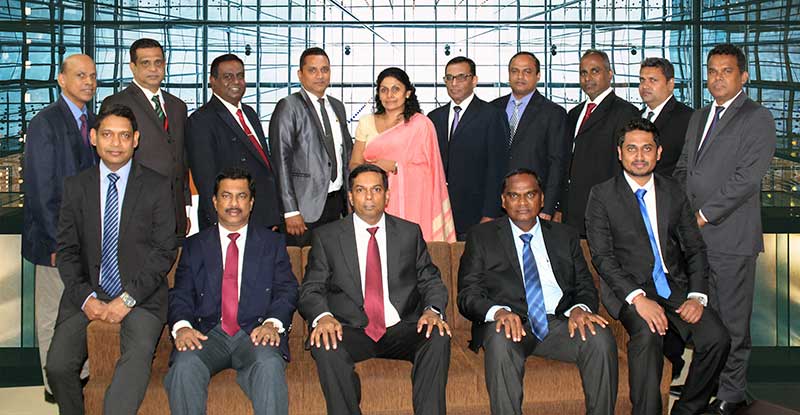 Lanka Sathosa Limited’s Management Team : Seated (from left) - Lakshman Kumara, Senior Manager – Procurement; Major Anura Pandithage (Retd.), Chief Executive Officer; Dr. Nushad M. Perera, Chairman; Susiri Perera, DGM – Finance and Dilantha Perera, Senior Accountant. Standing (from left) - Sumathi Hewavitharana, DGM - Information Technology; Chamila Suresh Botheju, Senior Manager – Engineering; Sisira  Gunawardana, Senior Manager - Human Resource & Admin; Commander Thushara Perera (Retd.), DGM – Procurement; Amitha Jayatunga, Chief Legal Officer / Board Secretary; Janak Sanjeewa Badugama, DGM – Operations; Wing Commd P. W. Primal (Retd.), DGM - Human Resource & Admin; Mewan Adihetty, DGM – Marketing; B. T. K. Nissanka, DGM - Internal Auditand Eng. Priyantha Godagama, DGM – Engineering. Not seen in the photograph - W. R. A. R. K. Ranasinghe, Acting Senior Manager – Operations; Aisha Nawfel, Acting Senior Accountant and Anushke Bastian, Assistant Manager - Information Technology. 