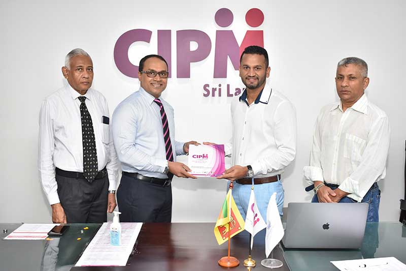 Jayantha Amarasinghe-President, CIPM Sri Lanka with CIPM Brand Ambassador Dimuth Karunaratne and officials.
