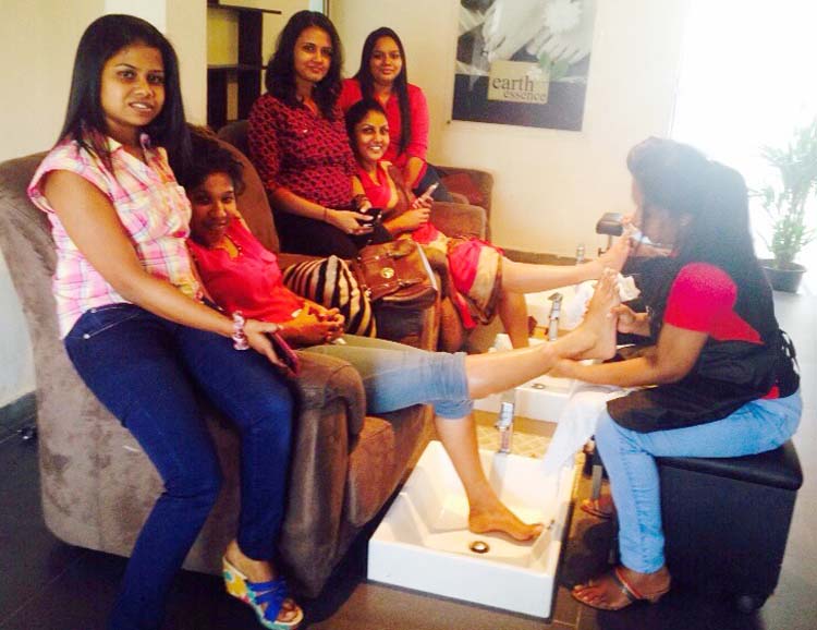 Female employees get pampered with pedicures