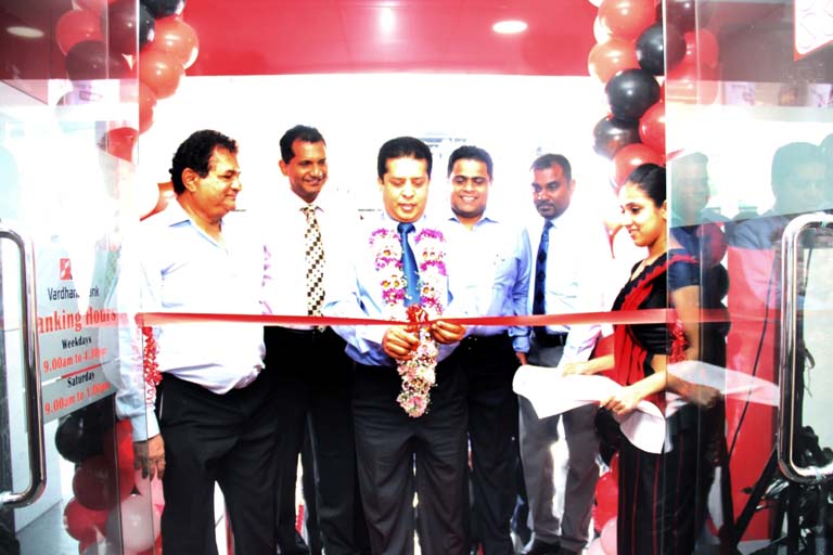 Lakshman Silva, Chief Executive Officer, DFCC Vardhana Bank cutting ribbon of new Gangodawila branch