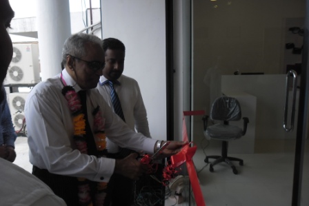 Municipality Mayor and Senior Attorney Nizam Kariyapper cuttting ribbon …