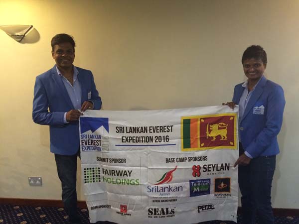 Johann and Jayanthi with the sponsor flag