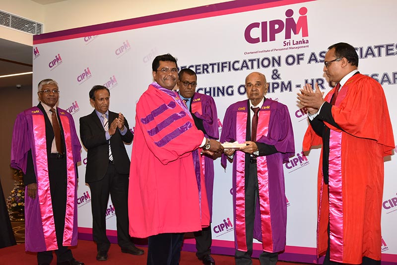 Pic_CIPM-President-presenting-the-First-Ever-HR-Glossary-to-the-HR-Glossary-Committee-Members