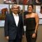 Photo 3 – Managing Director CJS Akram Cassim and Founder of Oceanswell Dr Asha de Vos stand in front of the Jacqueline Wall at the CJS Heritage Store