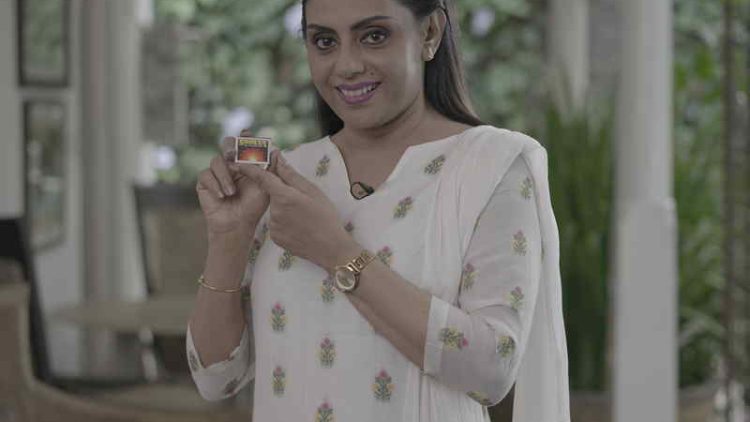 02 Image – Brand Ambassador for Soorya, Yashoda Wimaladharma, respected screen actress, with the Soorya Matchbox that can be scanned to access the Digital Litha